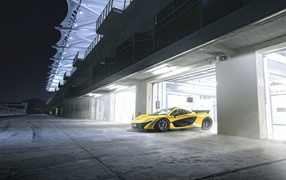 Yellow leaves the McLaren garage