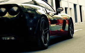 Car Chevrolet Corvette with the image of the US flag