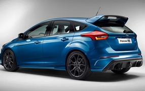 Blue Ford Focus RS on a gray background