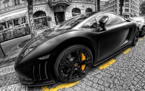 Black Lamborghini on the street in Paris