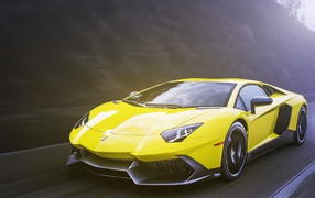 Bright yellow Lamborghini on the highway