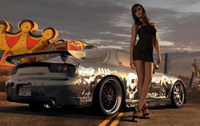 A girl stands at the car Mazda RX-7