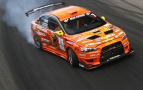 Drift orange Mitsubishi Lancer track