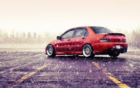 Мицубиши Лансер под дождем