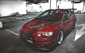 Красный Mitsubishi Lancer Evolution X