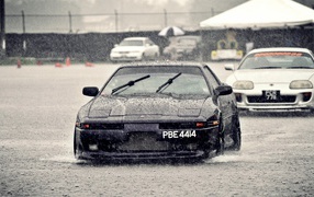 Black Nissan rain