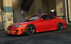 Red Nissan Silvia S15 in the garage