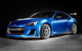 Голубой автомобиль Subaru STI Performance