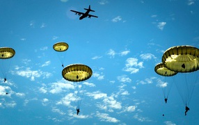 US paratroopers jumping from plane