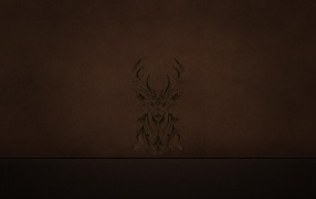 Силуэт оленя на коричневой коже