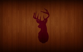 Силуэт оленя на паркете