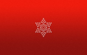 Снежинка на красном фоне