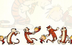 Мальчик играет с тигром в комиксе Кельвин и Хоббс