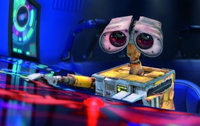 Робот WALL·E за пультом управления