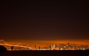 Оранжевое сияние над городом