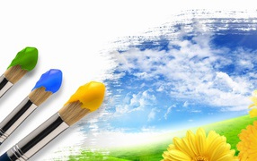 Кисти с краской на холсте