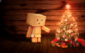 Картонный человечек празднует Рождество