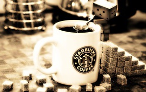 Дандо кладет сахар в кофе