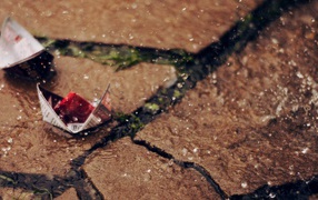 Бумажные кораблики под дождем