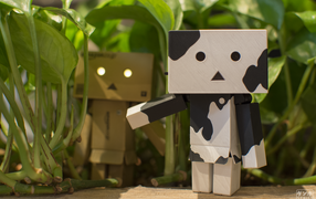 Два Дандо под листьями