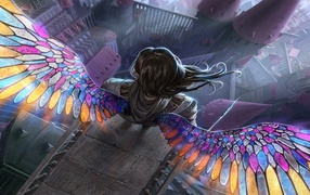 Ангел с радужными крыльями на краю