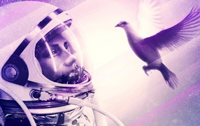 Космонавт смотрит на птицу