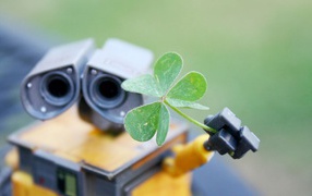 Робот Валли подает зеленый росток