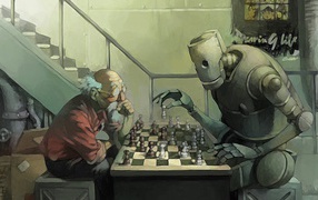 Робот играет в шахматы с пожилым мужчиной