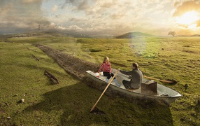 Двое в лодке среди поля