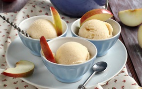 Ice cream with mango slices of apples