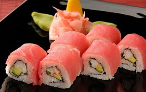 Sushi rolls with pink fish