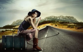 Девушка ждет попутную машину