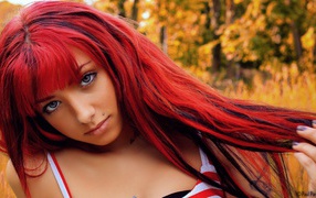 Девушка с красными волосами и кольцом в носу