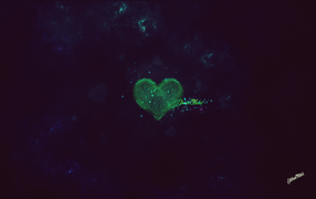 Green heart on a black background