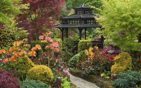 Black wooden pergola in the Japanese garden