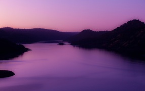 Purple twilight after sunset in the mountains