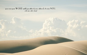 The inscription on the background of clouds and the desert