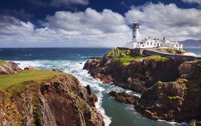Lighthouse on an island off the coast