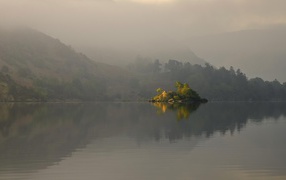The island on a misty lake