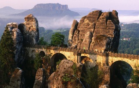 Bridge on the rocks in the mountains