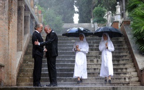 Монахи под дождем