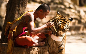 Tibetan monk and his pet