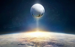 Белый спутник над планетой