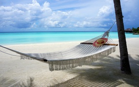 White hammock on the beach, Maldives