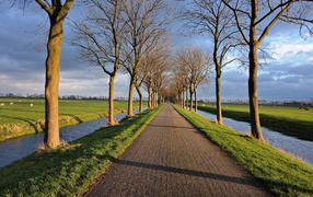 The road and the walkway between the two channels