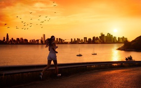 Woman jogging at evening promenade