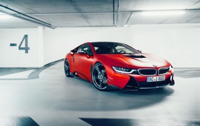 Красный спортивный автомобиль BMW i8 AC Schnitzer ACS8