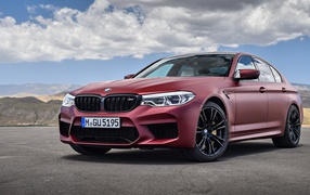 New burgundy car BMW M5 First Edition, 2018