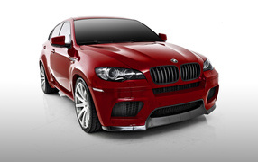 Red car BMW X6 on a white background
