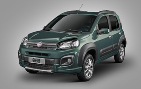 Зеленый автомобиль Fiat Uno Way на сером фоне